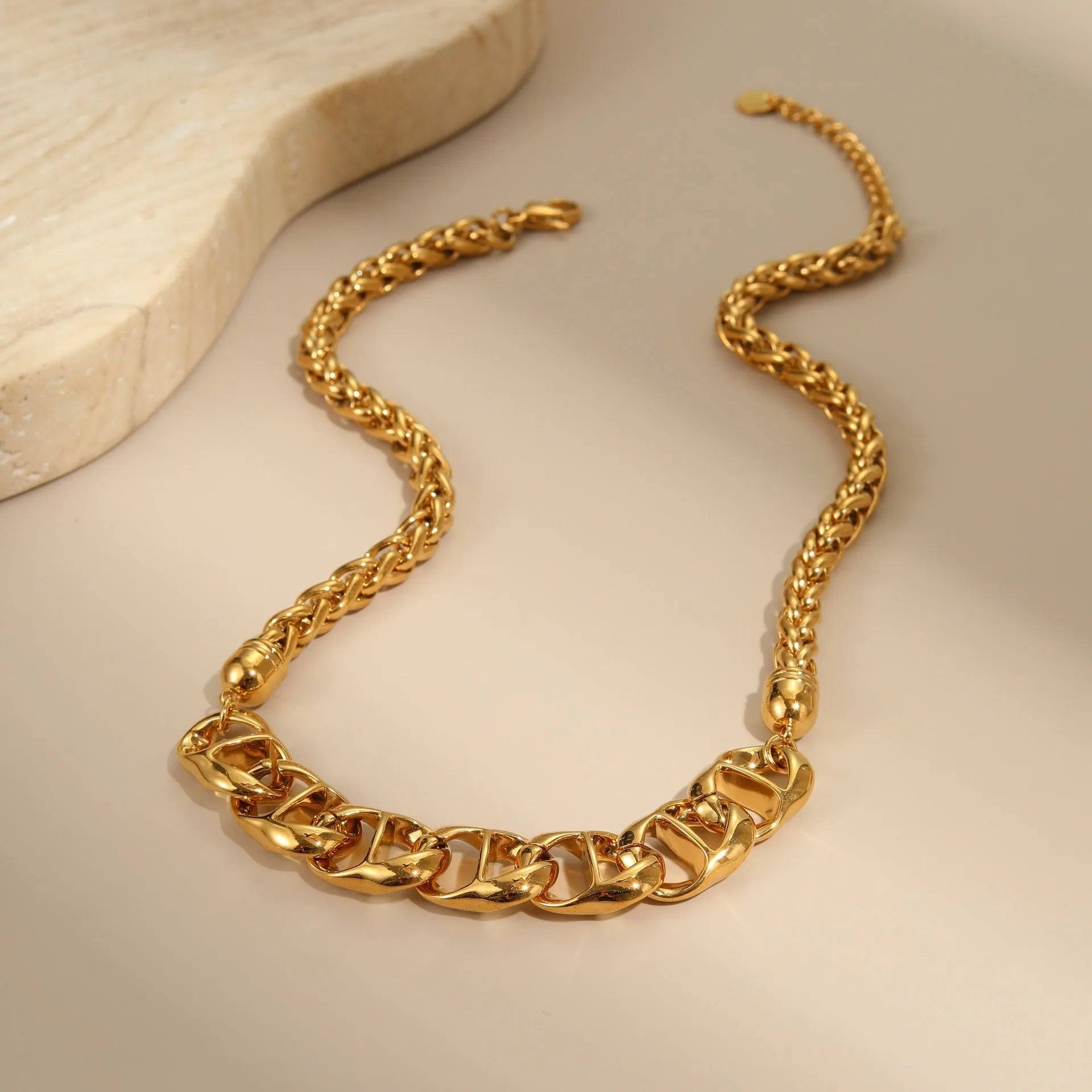 Women's stainless steel necklace with geometric pendant and gold plating in two colour options
