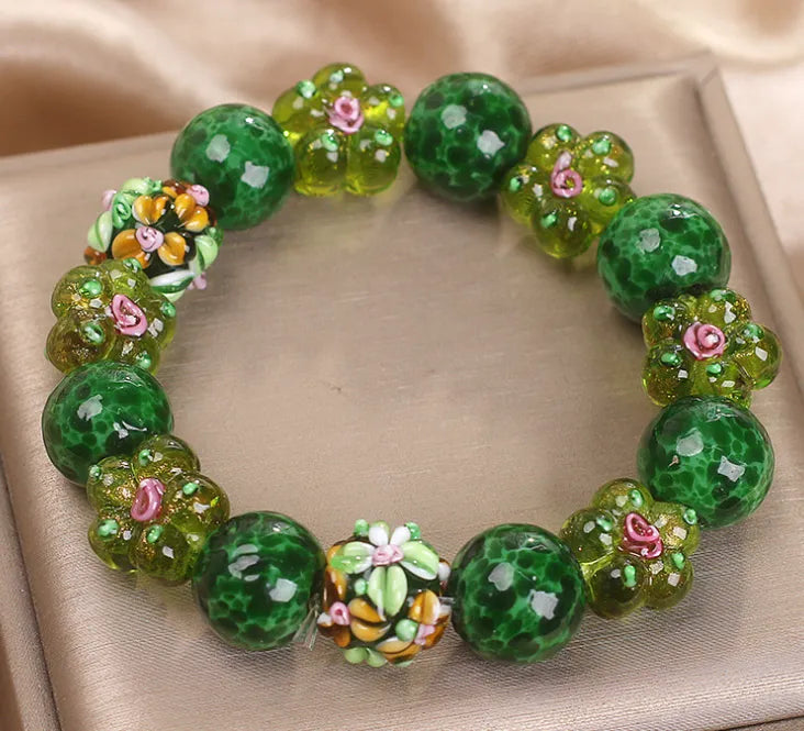 Chinese ancient flower glazed bracelet for women, green electroplated finish with floral charm