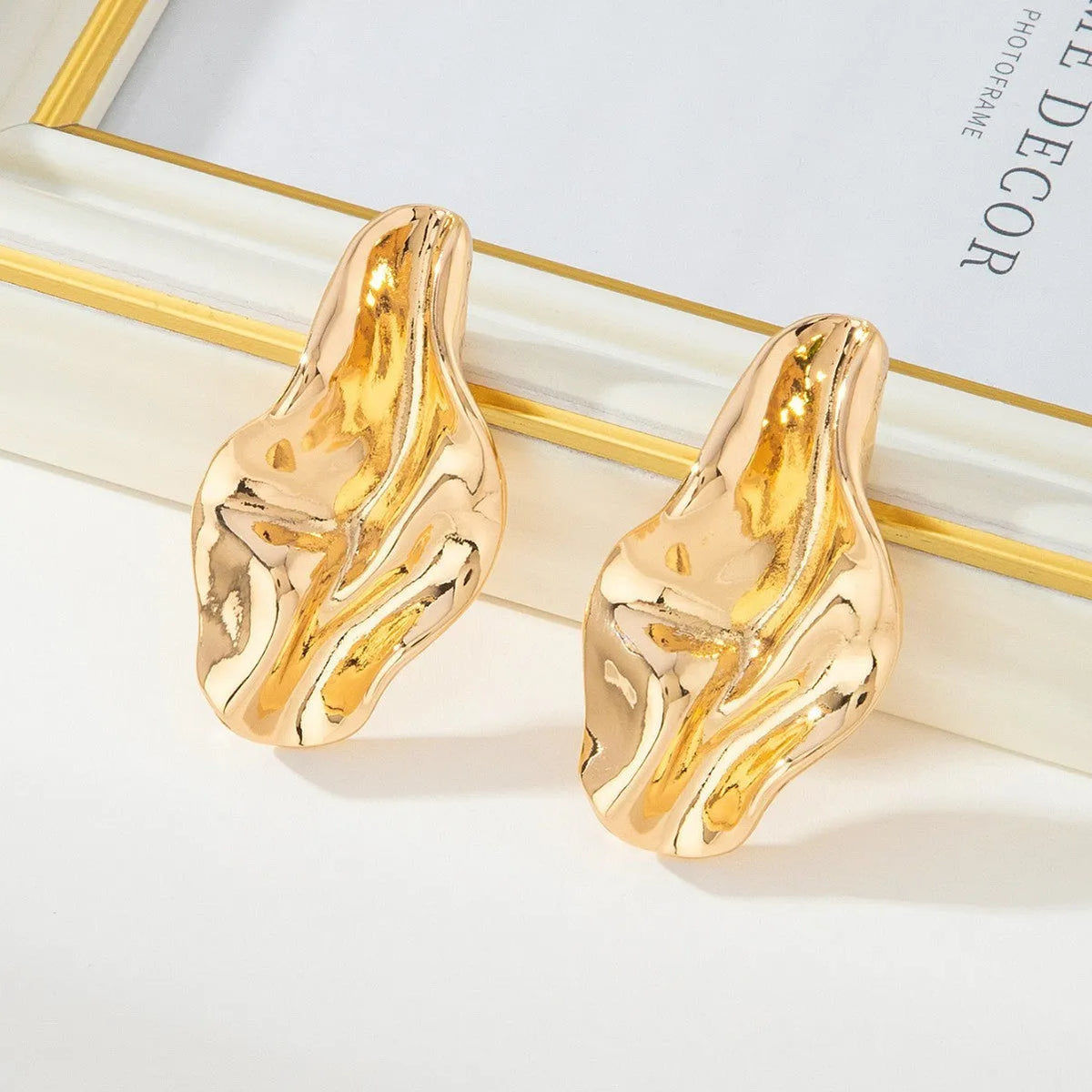 Gold irregular twisted stud earrings with diamond, drop, and geometric shapes, zinc alloy electroplated, one pair for women