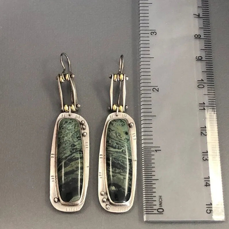 Geometric alloy earrings with two-colour marble pattern design