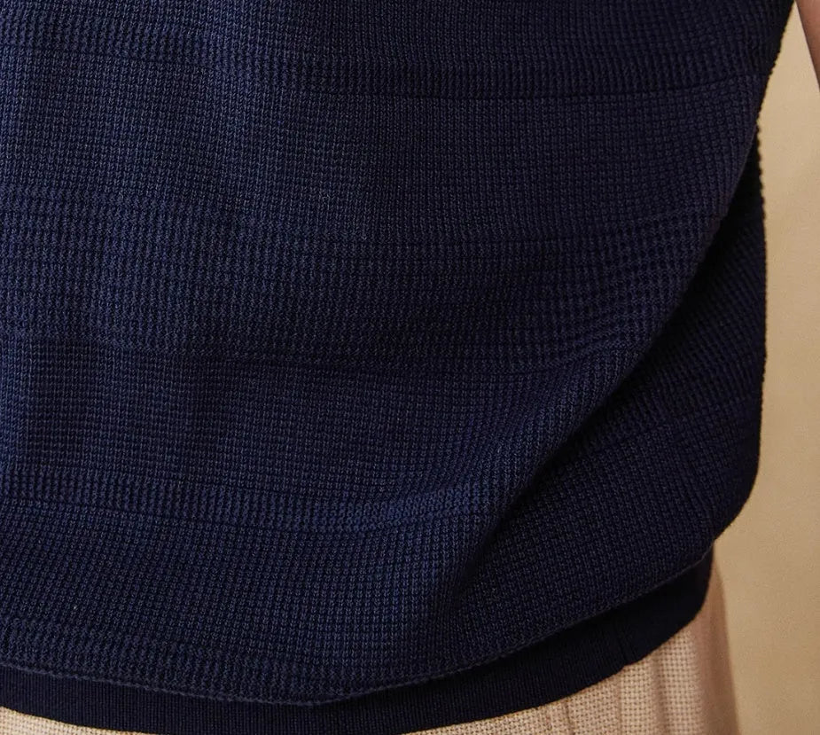 Men's off-white pure cotton short sleeve T-shirt with a round neck on a hanger.