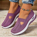 Women's light grey mesh casual flats with a T-strap and round toe on a soft PVC sole.