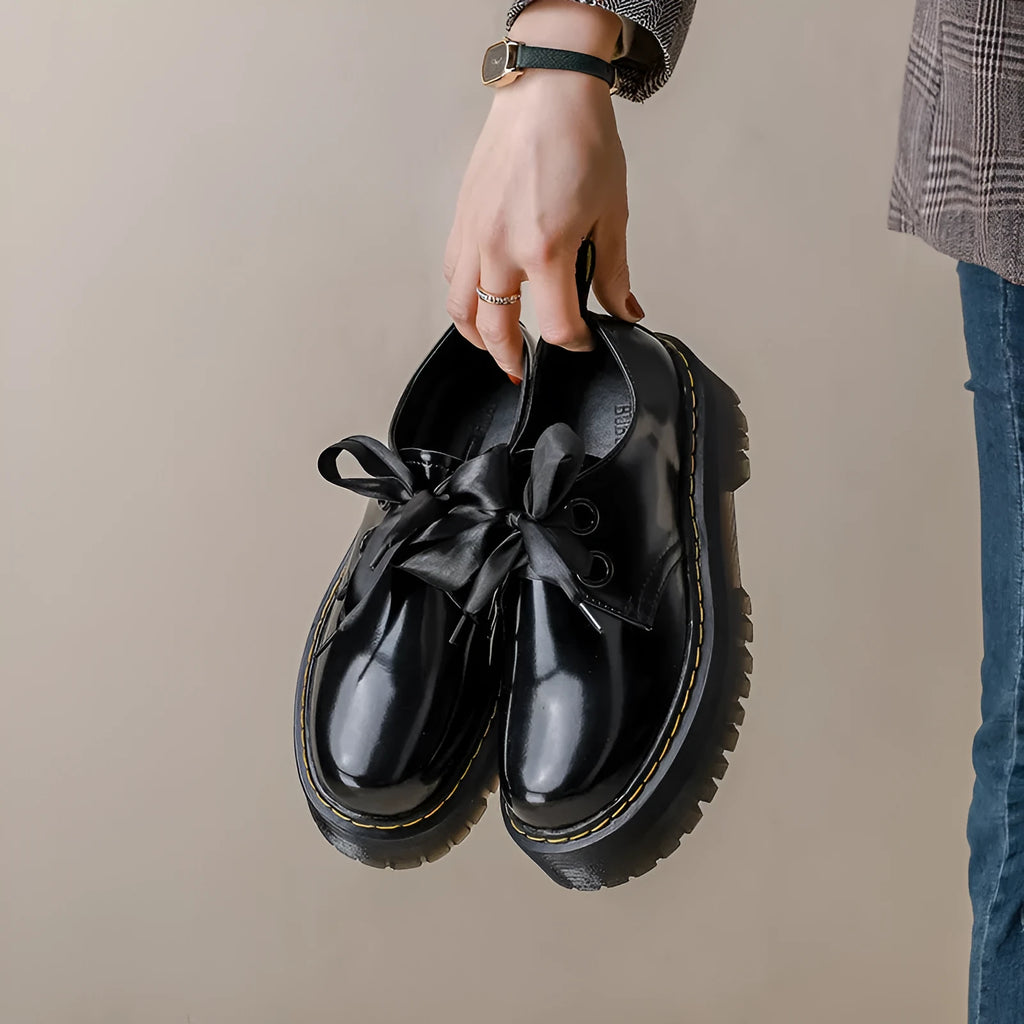 Women's black thick-soled shoes with ribbon laces and cross-strap design on superfine fibre upper