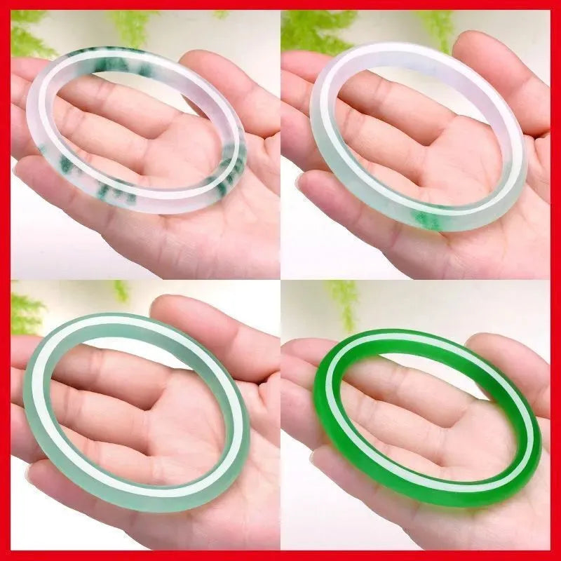 Jade bracelet with floating flower design and auspicious cloud patterns in green colour