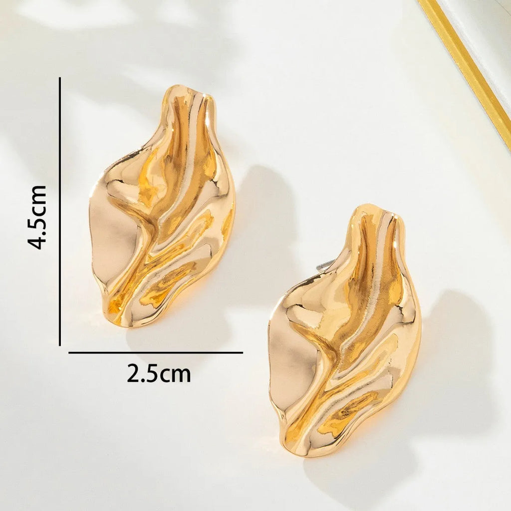 Gold irregular twisted stud earrings with diamond, drop, and geometric shapes, zinc alloy electroplated, one pair for women