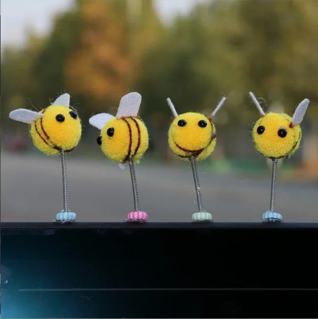 Swing spring bee car decoration made from soft fur ball material measuring 3x3cm
