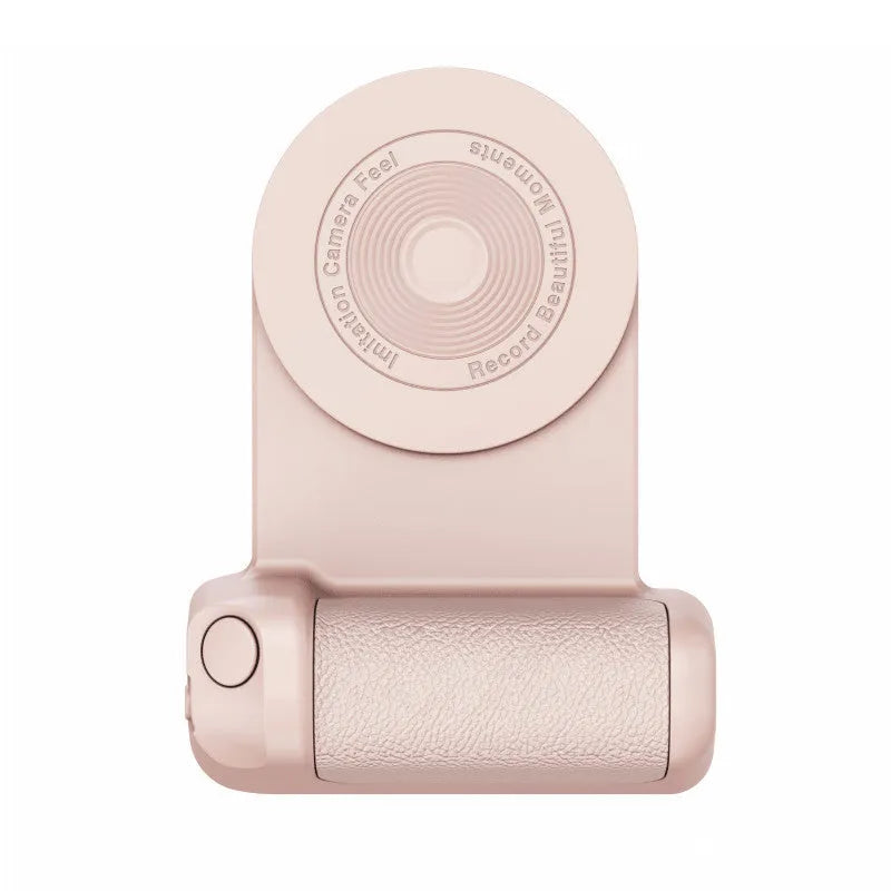 Black magnetic camera handle phone bracket with rotatable grip on wooden table