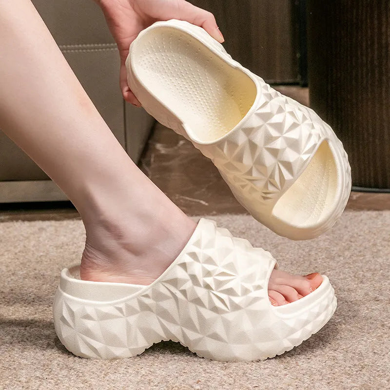 Women's Eva flip flop slippers with a thick sole in khaki, black, or white.