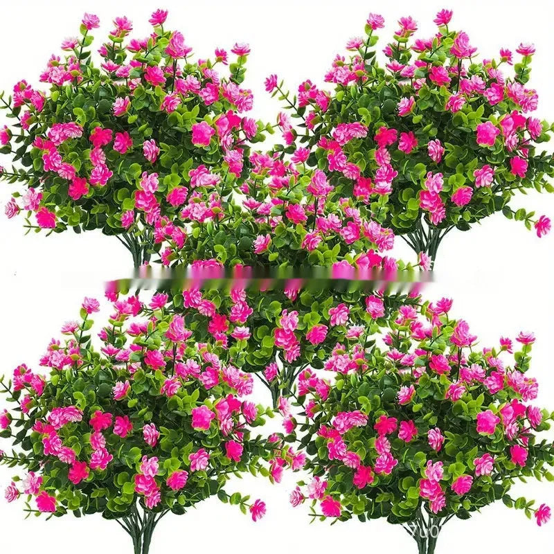 Artificial eucalyptus camellia plastic bouquet in mixed colours on white background