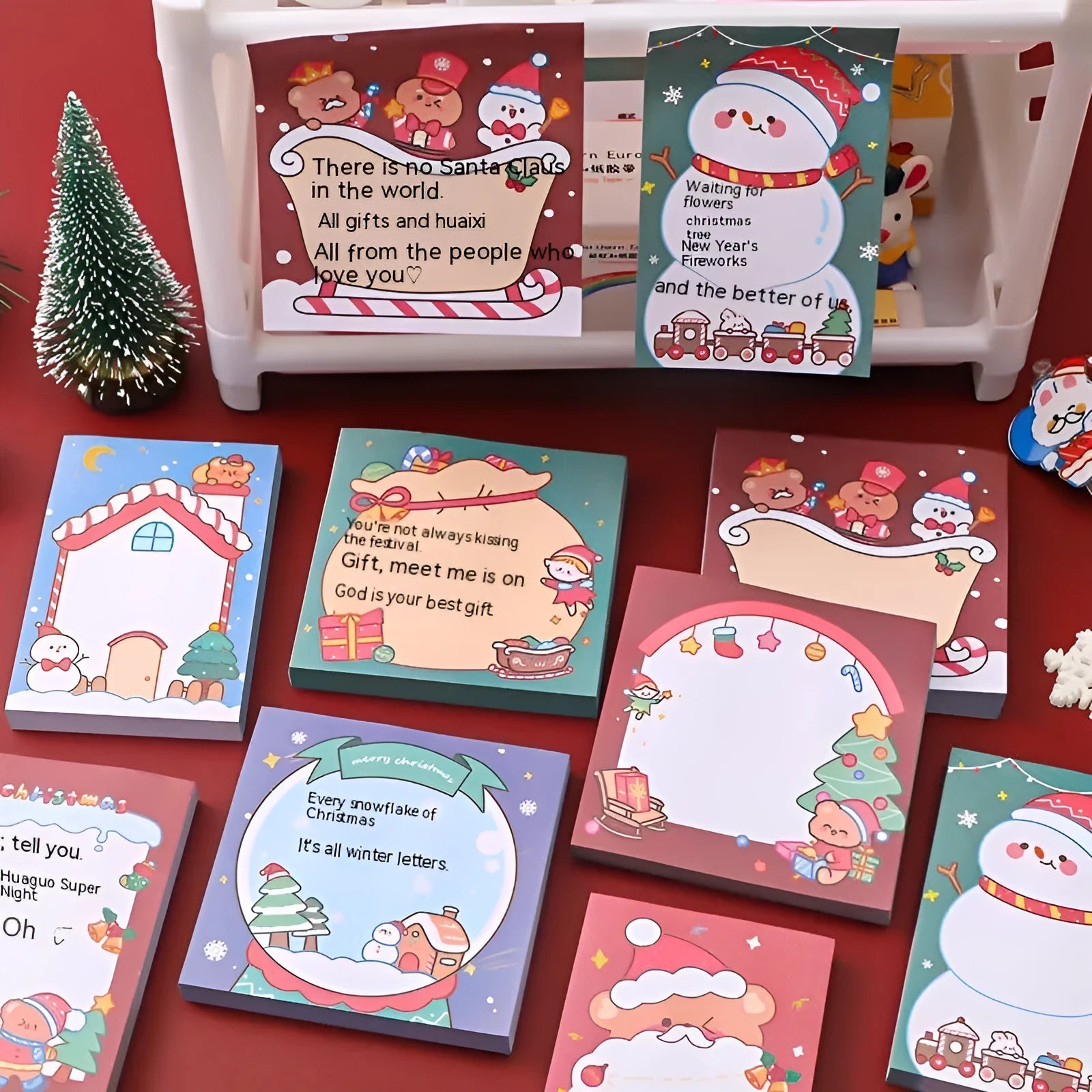 Christmas cartoon sticky notes pad with Santa, snowman, elf, gift, sled, house, bear and crystal ball designs