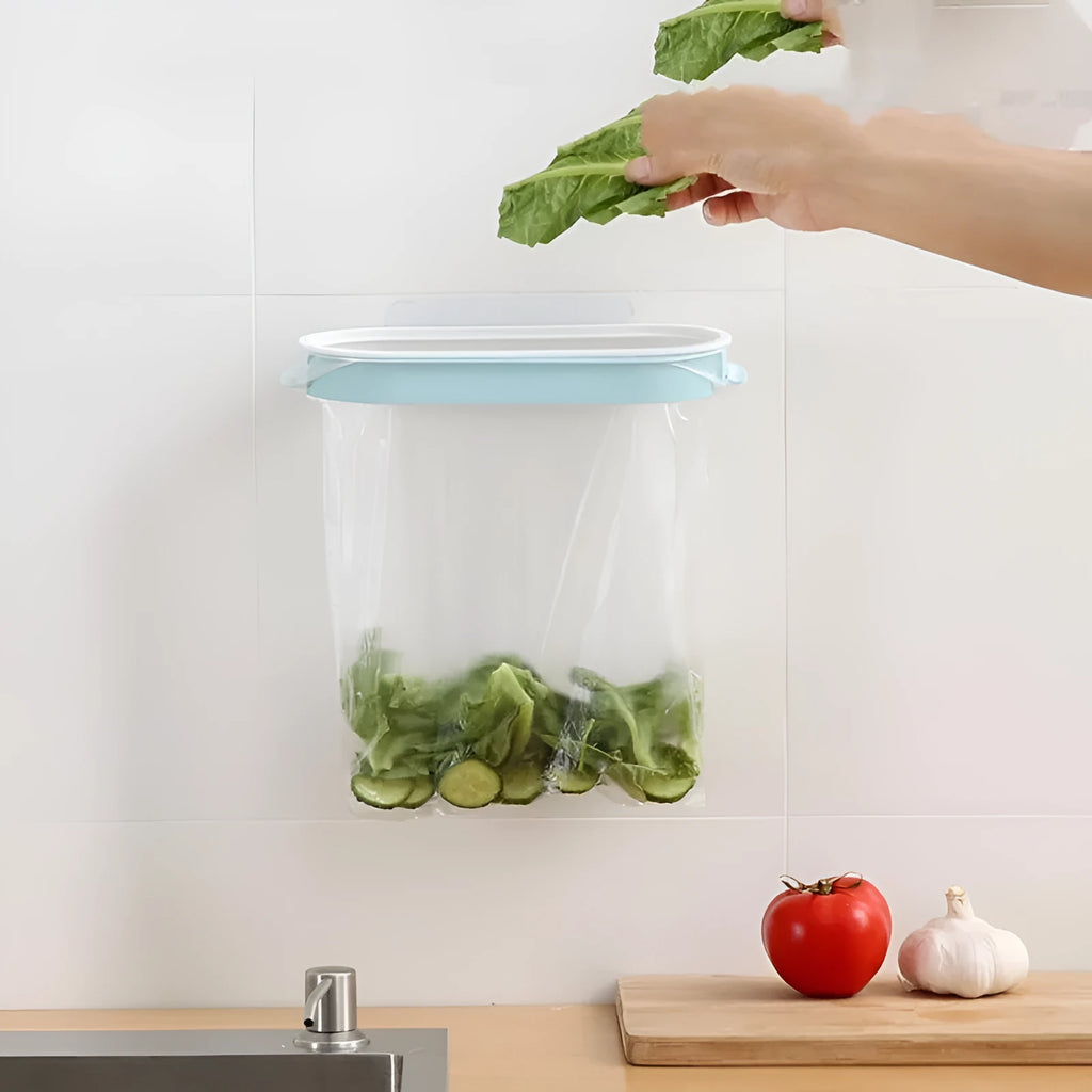 Blue plastic kitchen garbage bag storage rack mounted on cabinet door