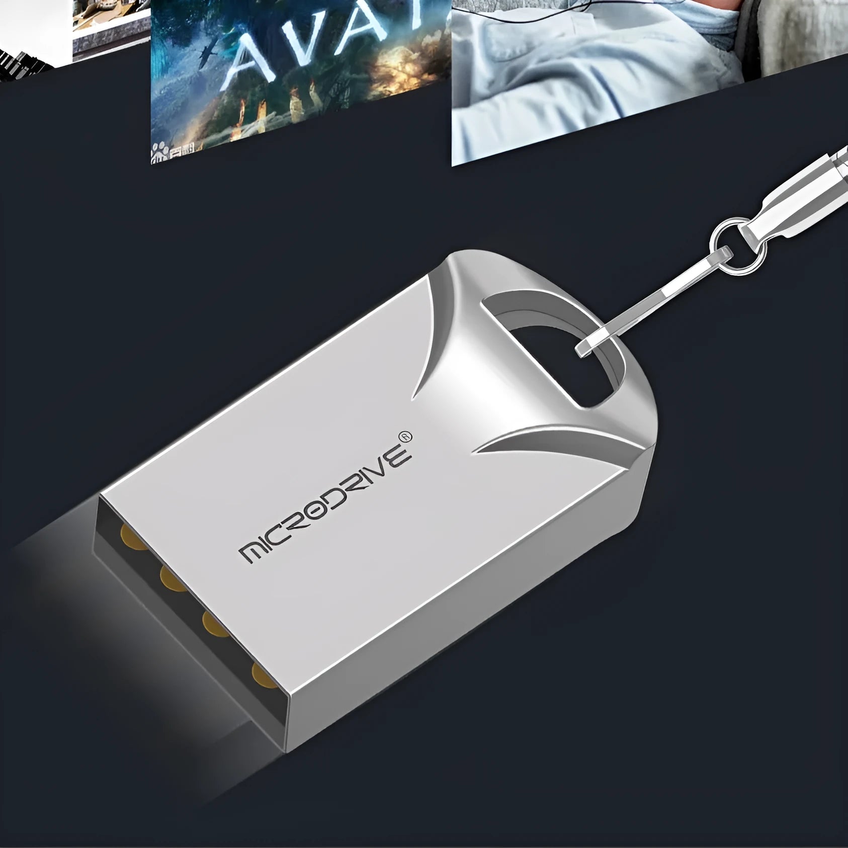 Small black and silver metal USB flash drive showing miniature size