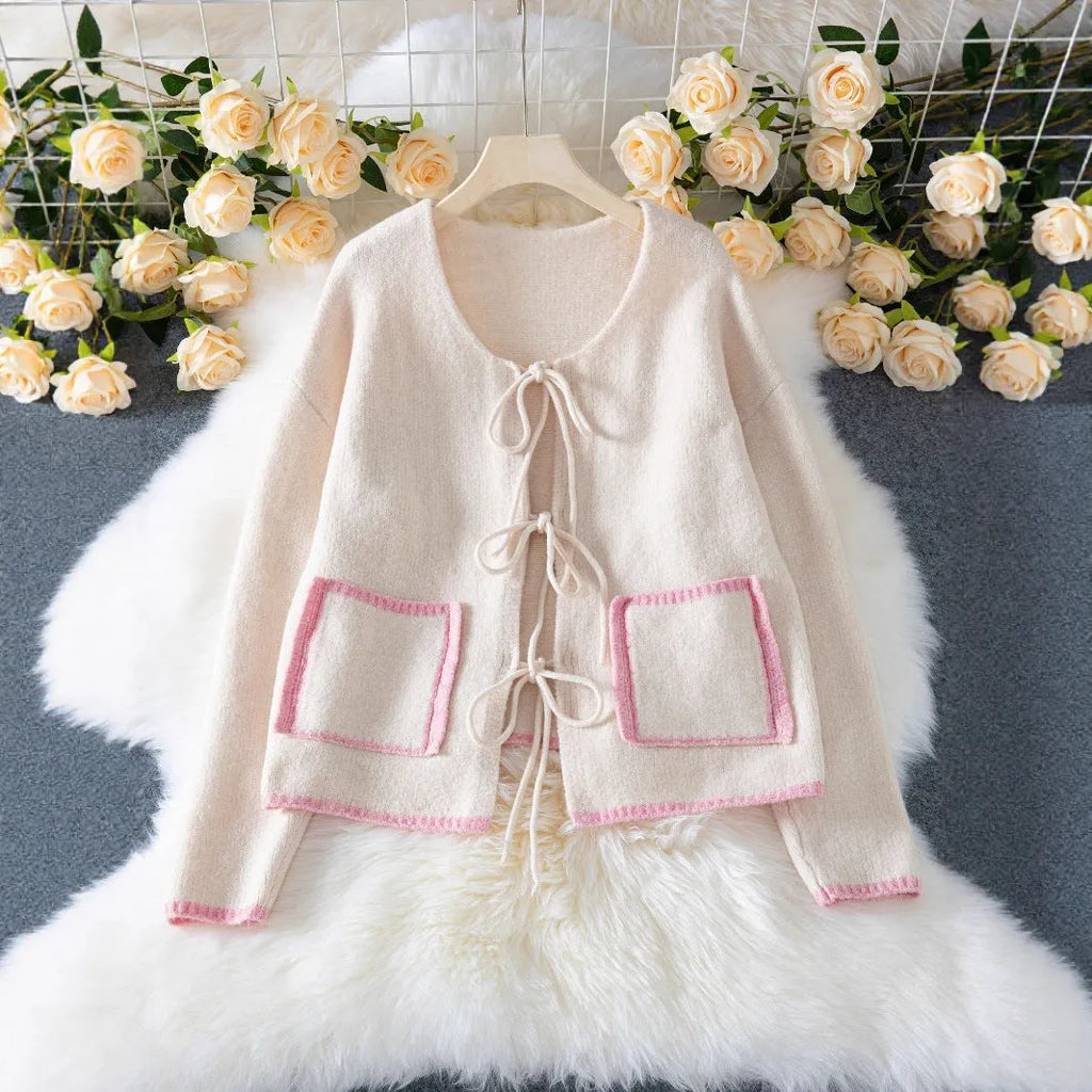 Women's beige loose knitted cardigan with contrast colour, front lace-up, and pockets, polyester, sizes S to XL