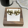 Cute little horse earrings in Gold Tone and Silver Tone, shown in two styles for daily wear