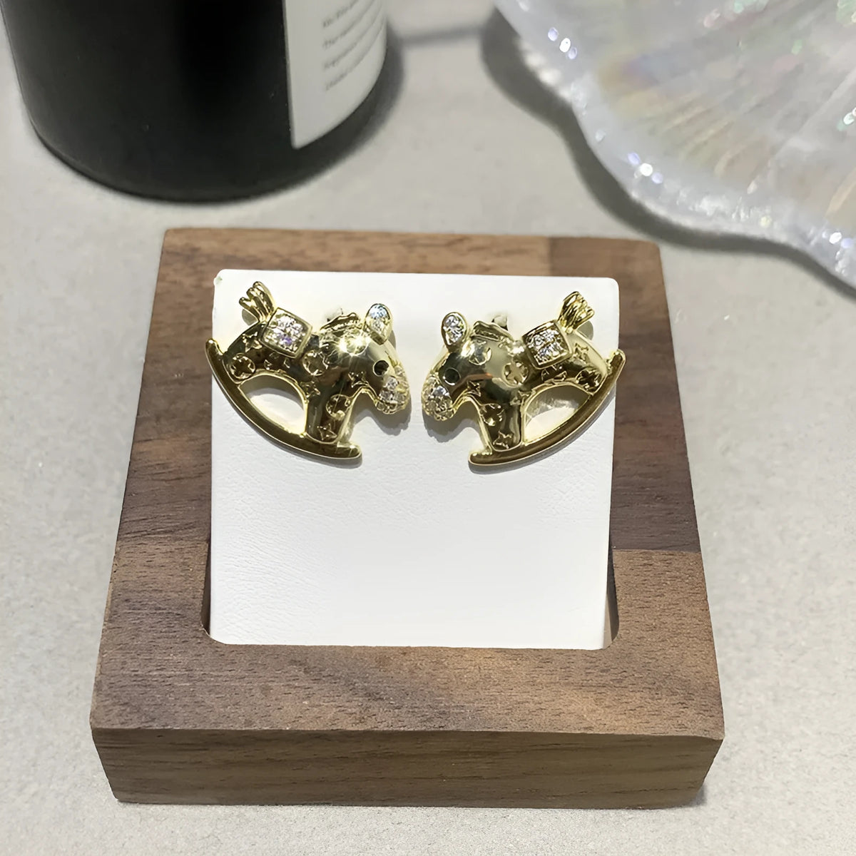 Cute little horse earrings in Gold Tone and Silver Tone, shown in two styles for daily wear