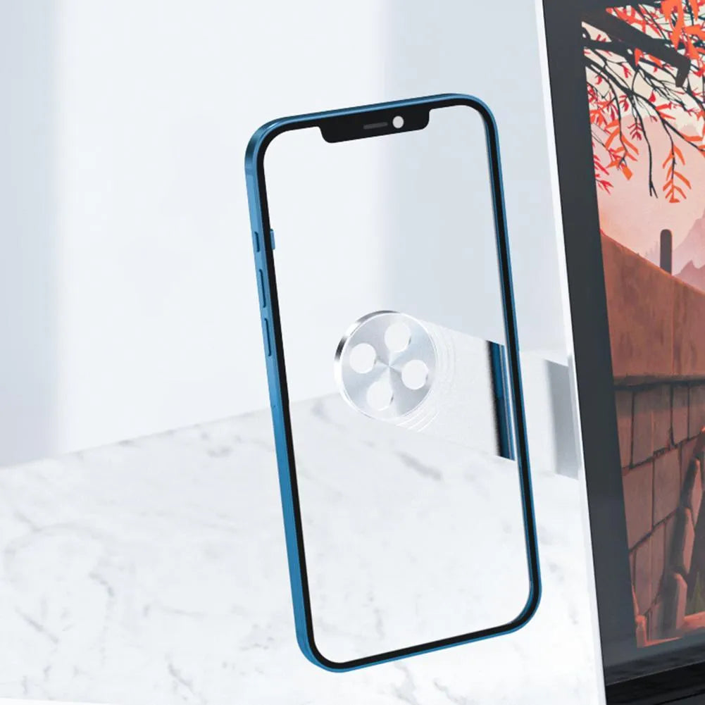 Black aluminium magnetic phone holder attached to side of silver laptop