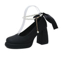 Beige women's Mary Jane shoes with a chunky heel, round toe, and an ankle-strap buckle.