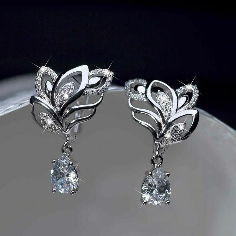 Leaf inlaid drop zircon earrings for women, copper floral design with platinum finish, white gold colour option