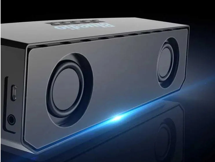 Black rectangular smart speaker with AI voice assistant, showing front grille and micro-USB port.