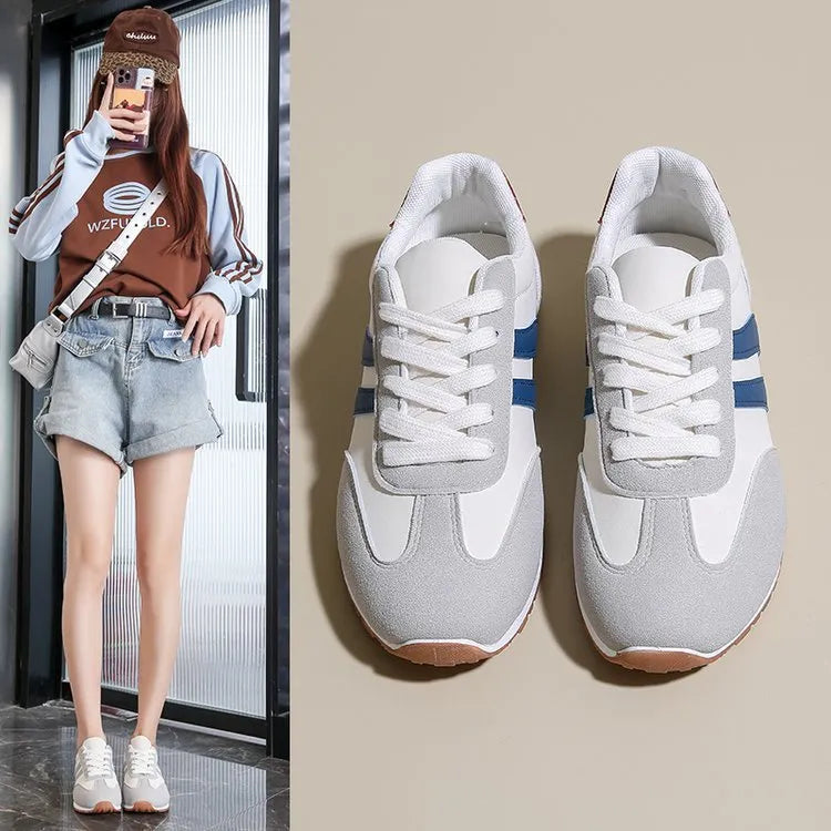 Blue and grey Cortez stripe leisure sports shoes with round toe and flat rubber sole.