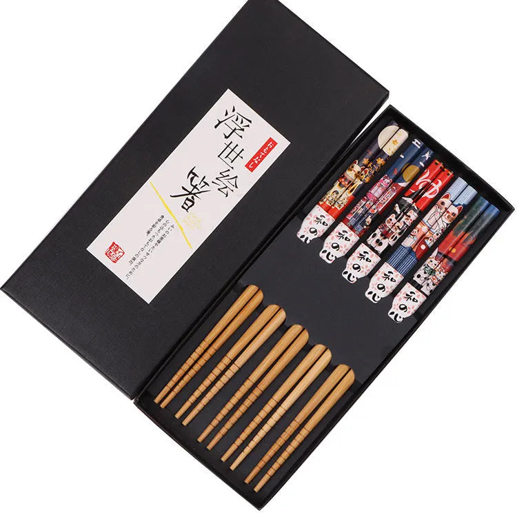 Bamboo chopsticks set with Japanese lucky cat and chi ya blue cartoon patterns, 5 pairs in packaging.