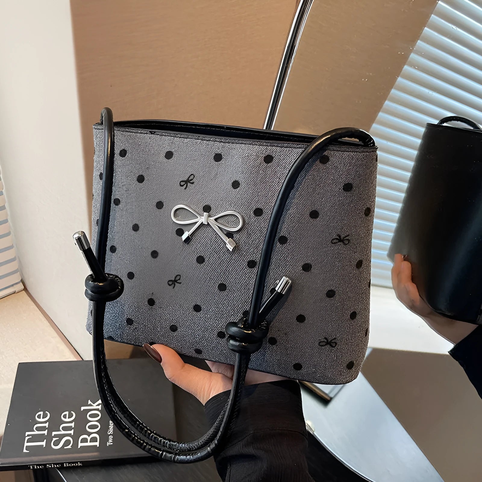 Canvas polka dot crossbody bag in bow design with double shoulder straps, hard medium shape, four colour options