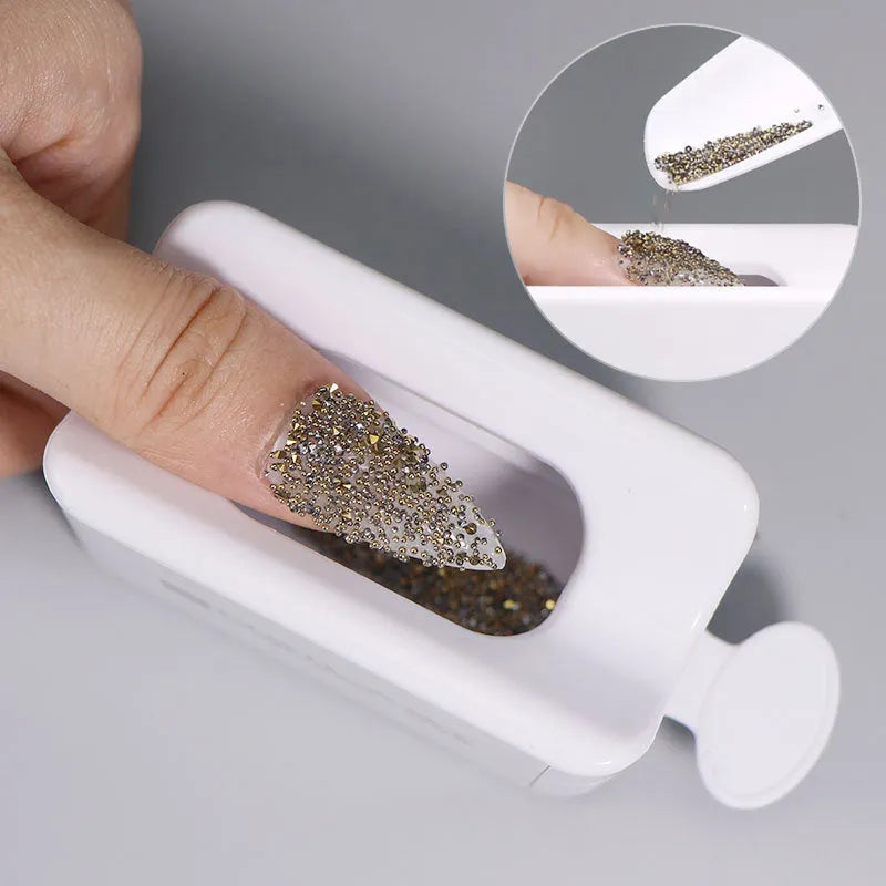 Three-layer white plastic nail powder box on a table for storing nail powder containers