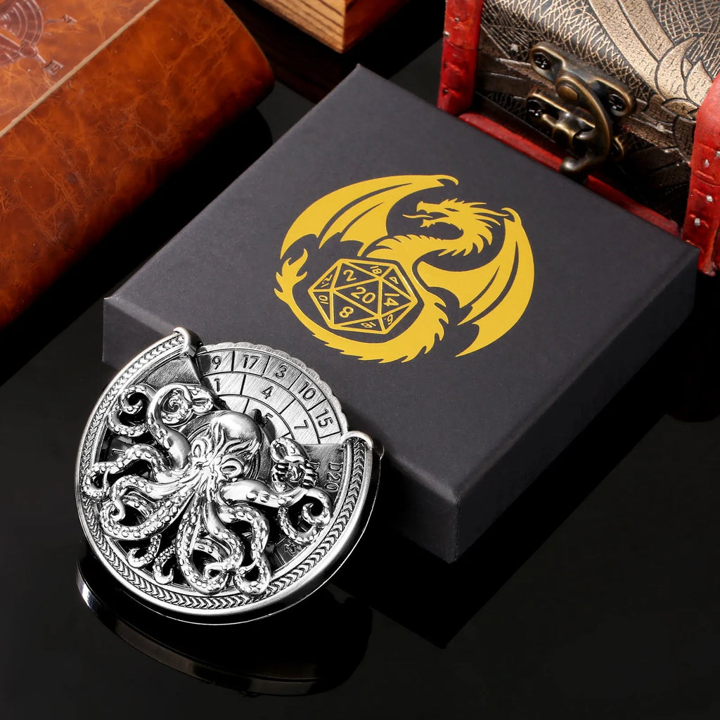 Vintage metal octopus dice turntable in bronze finish on tabletop, compact dice rolling accessory