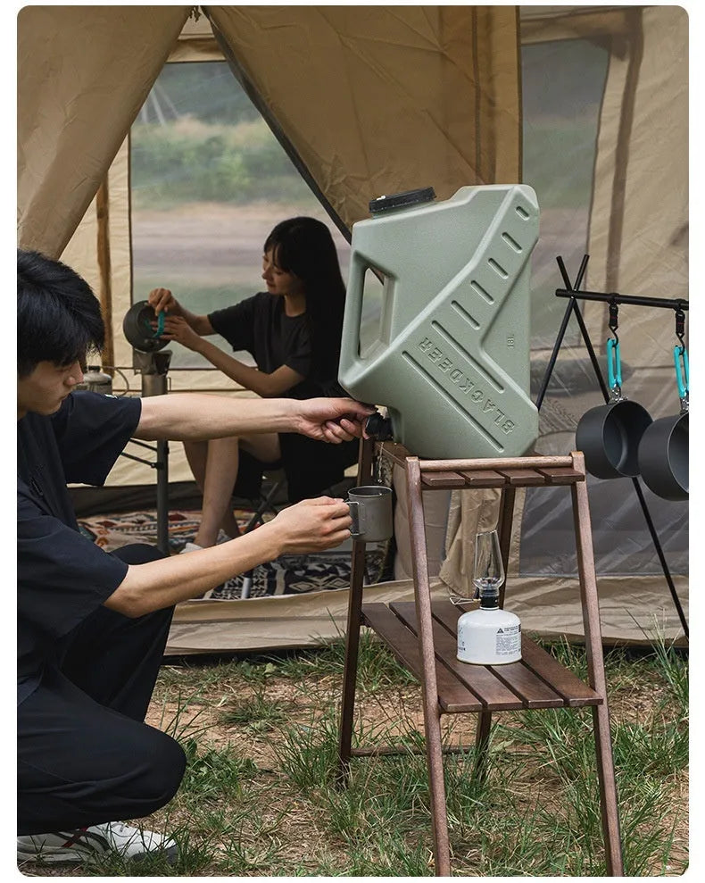 Green collapsible PP water storage tank with carry handle in 13L and 18L sizes.