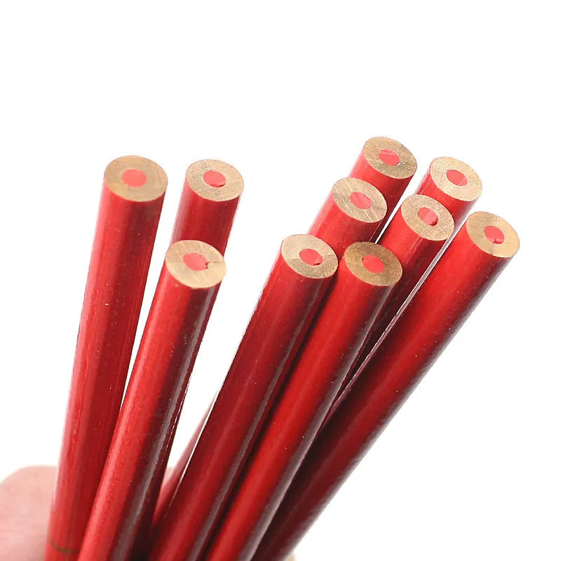 Ten red and blue round wooden carpenter's pencils for construction marking.
