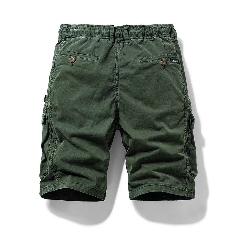 Men's army green cotton shorts with zipper fly and multiple pockets, laid flat.