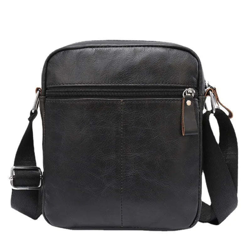 Black leather messenger bag for boys with 8-inch size and visible stitching