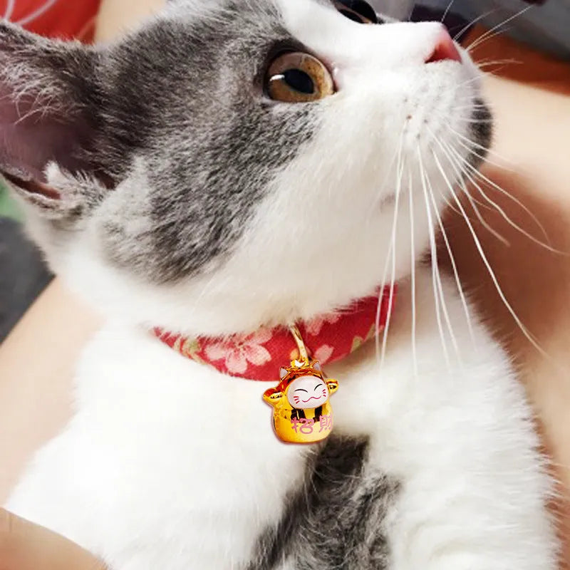 Cat collar with small Japanese bell made from cotton, linen, and copper, available in Black big flower and Red plum