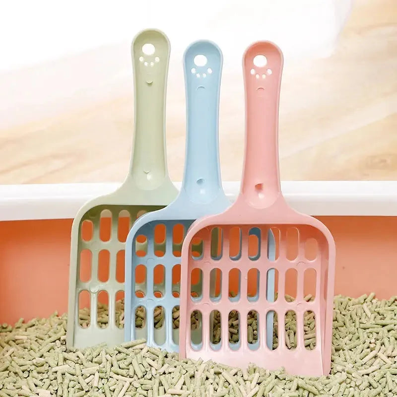 Blue plastic cat litter scoop with dimensions 20cm long, shown on a white background.