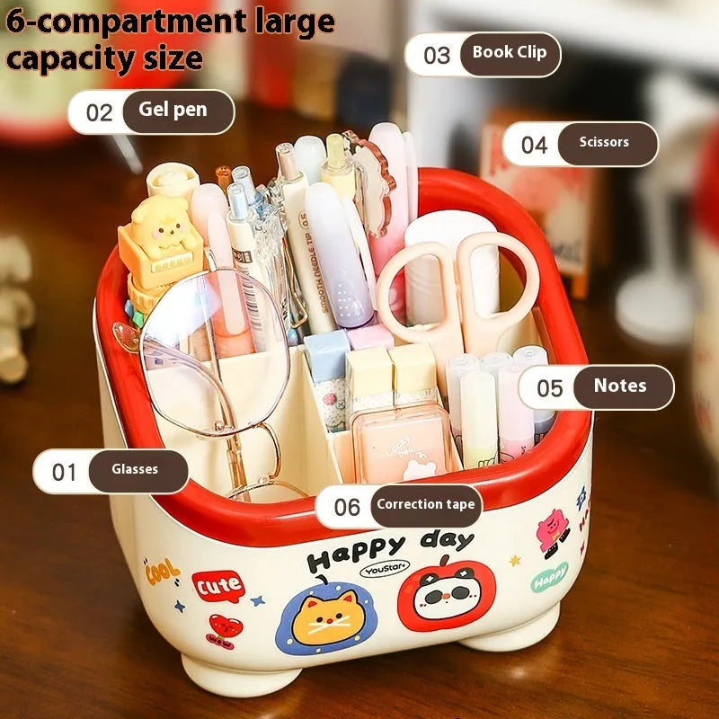 Cartoon-style plastic desktop organiser with various red and brown storage boxes and a pen holder.