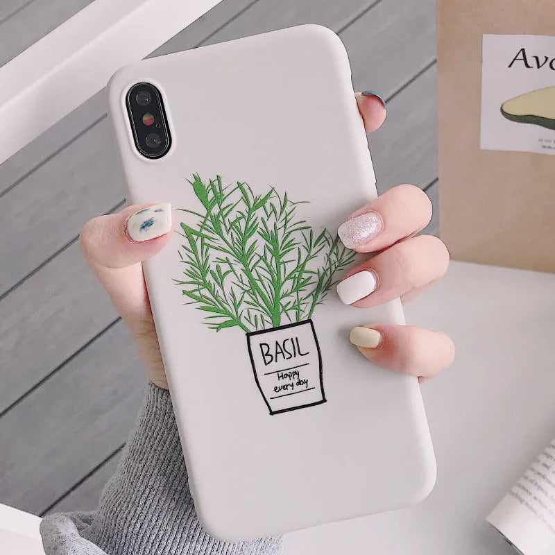 White silicone iPhone case with detailed green painted plant leaves design on the back.