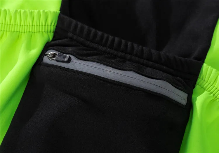 Unisex soft shell thermal fleece cycling jacket in black with green, side view