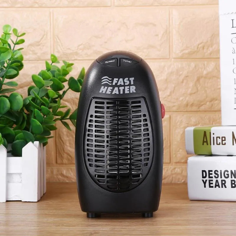 Black compact mini electric heater with digital display and a rotating three-prong plug.