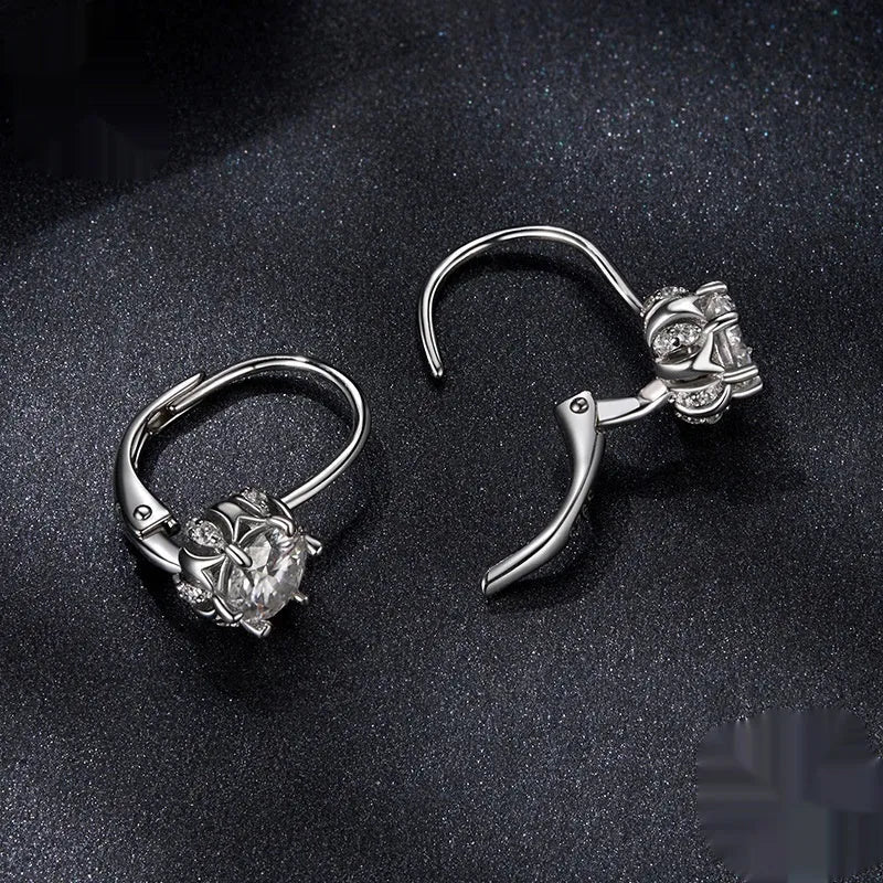S925 sterling silver flower bud ear clip with moissanite stone and white gold plating.