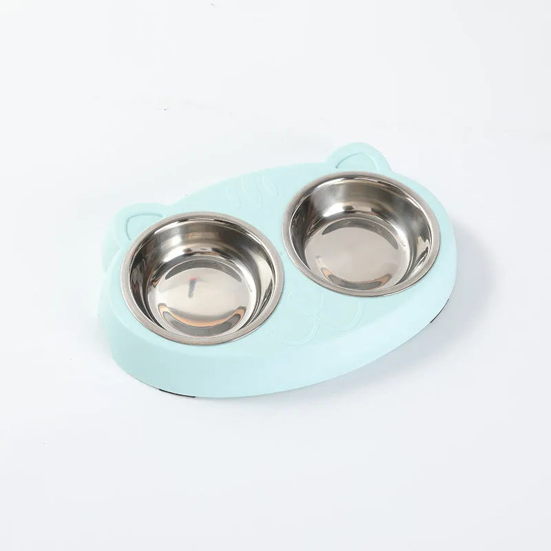 Blue macaron-shaped plastic pet feeder tray with two bowls for cat or small dog food and water.