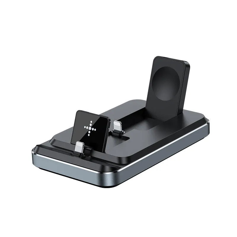 Flat folding three in one wireless charger in black with phone, watch, and headphones placed on charging zones