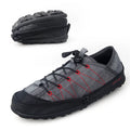 Orange portable folding outdoor shoe with mesh upper and side zipper, shown partially folded.
