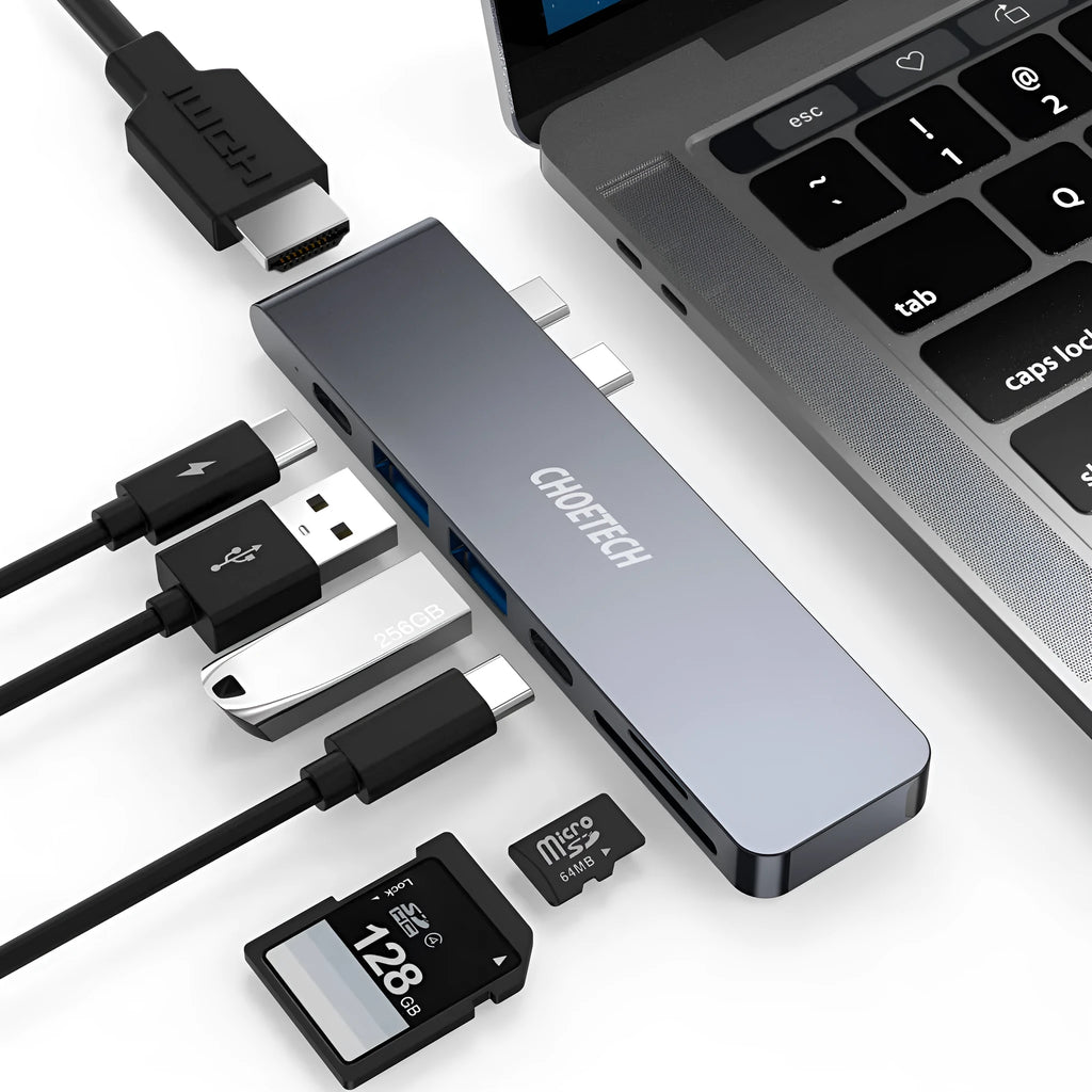 Compact aluminium USB-C hub showing ports: Thunderbolt 3, USB-C PD, HDMI, SD card slot, and two USB 3.0