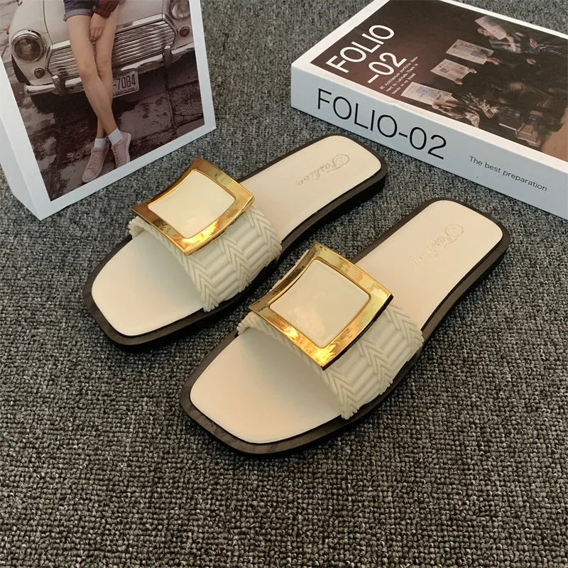 Women's flat casual slippers in apricot colour with a textured non-slip PVC sole.