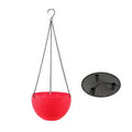 Black plastic hanging basket planter with chain, showing inner liner.
