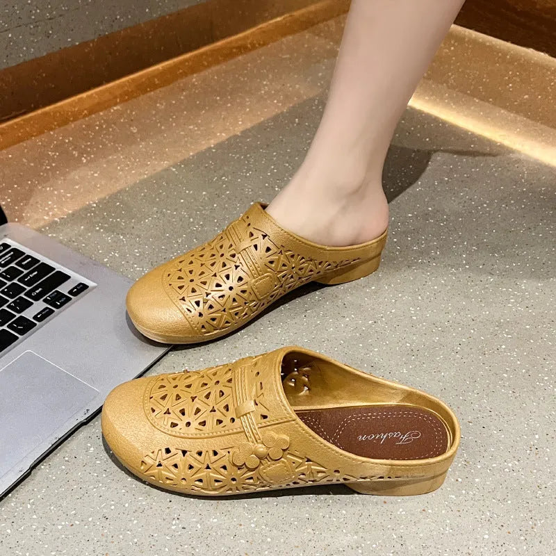 Women's apricot fairy style PVC half slippers with hollow-out design and flat toe box.