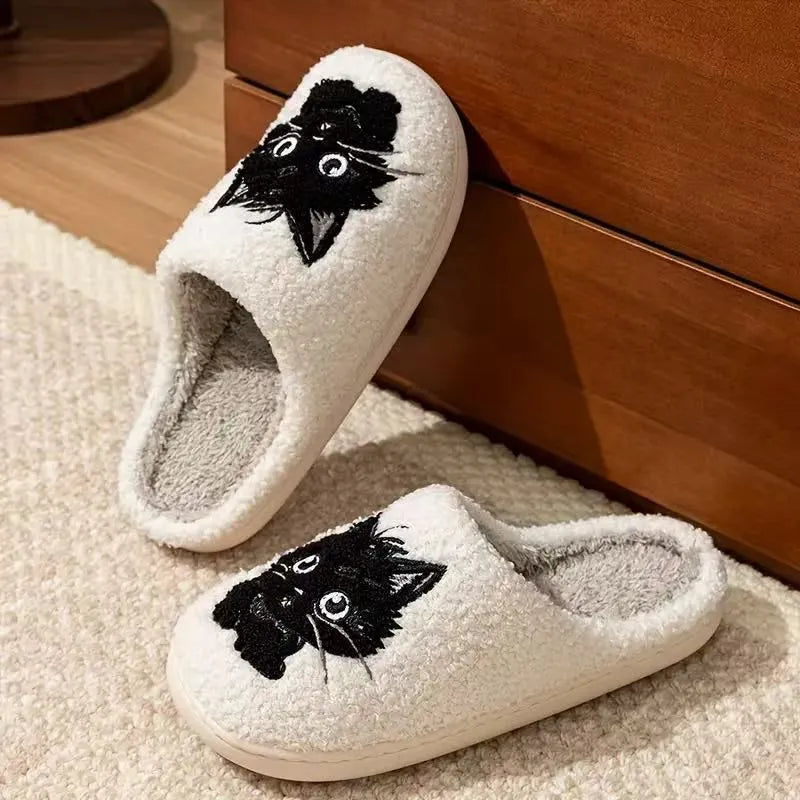 White plush slippers with Black Beard Cat cartoon couple design, showing thick construction and textured TPR sole.