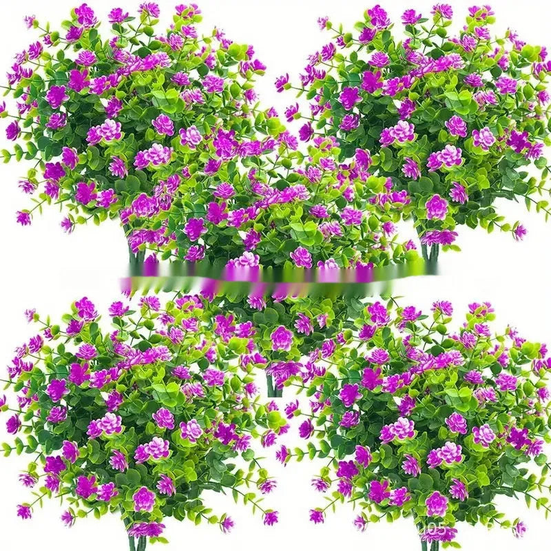 Artificial eucalyptus camellia plastic bouquet in mixed colours on white background