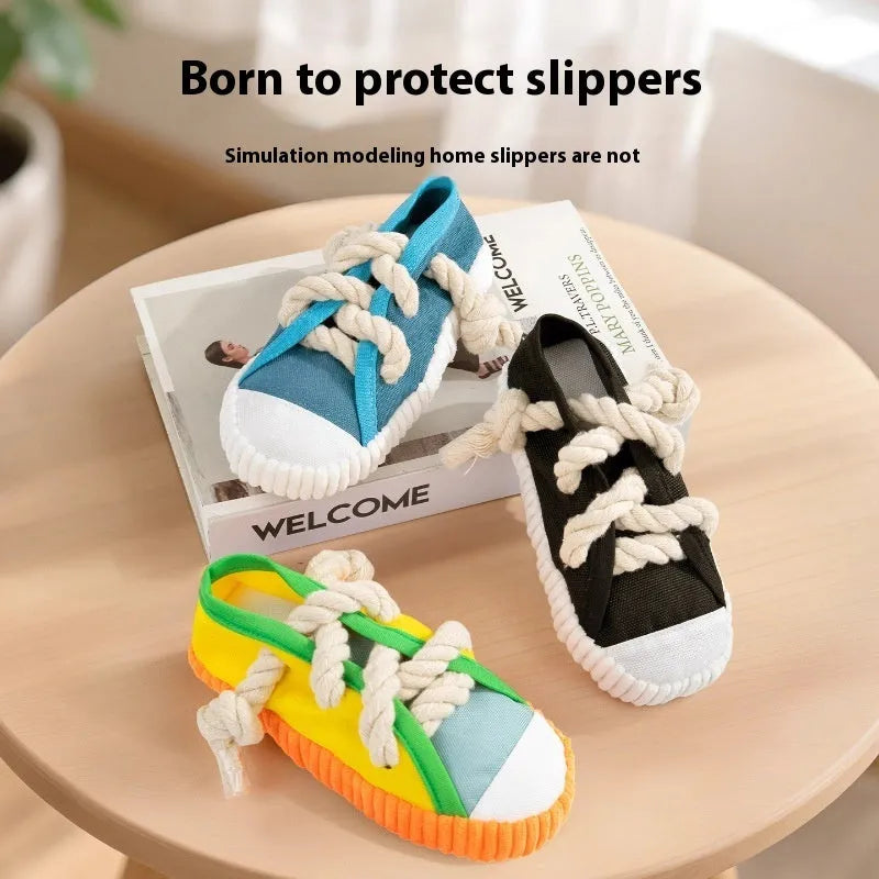Plastic dog slippers toy with sound mechanism in yellow, black, or blue colours for chewing and interactive play