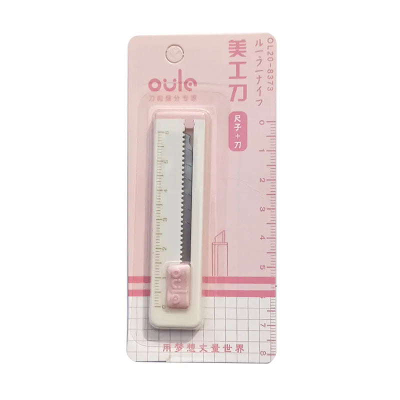 Small plastic blade art knife in five colour options measuring 7.2 by 1.5 centimetres